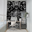 Black and silver baroque wallpaper in elegant living room with high ceilings