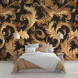 Baroque black and gold wallpaper mural in a luxury dining room with crystal chandelier and dark wood furniture