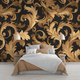 Baroque black and gold wallpaper mural in a luxury dining room with crystal chandelier and dark wood furniture