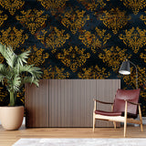 Black and gold damask wallpaper creating luxury atmosphere in master bedroom