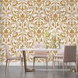 Damask pattern wallpaper brightening formal dining room with soft golden accents