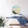 Beach house wallpaper mural in modern living room, creating a window-like view to the coast