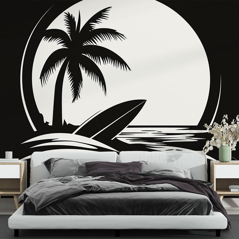 Black and white beach mural wallpaper creating a modern coastal feel in a minimalist living room with clean furniture lines