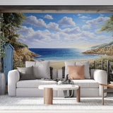 Beach scene wallpaper creating a sunny coastal atmosphere in a modern living room with white furniture