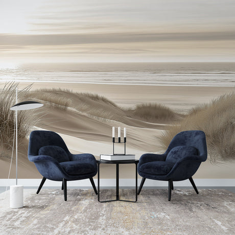 Beach landscape wallpaper creating a serene atmosphere in a modern living room with natural light and minimal furniture