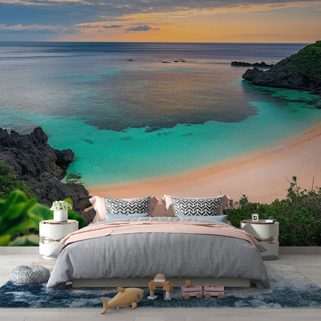Tropical beach paradise wallpaper creating a stunning focal point in a modern living room with clean white furniture