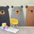 Bear mural wallpaper in a cozy Scandinavian nursery with rocking chair and soft lighting
