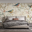 Botanical bird wallpaper creating a peaceful atmosphere in a bright living room with natural light highlighting the vintage songbird design