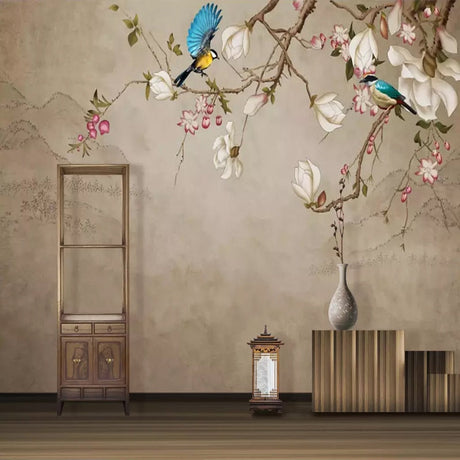 Birds and magnolia wallpaper in a bright dining room with natural light showing blue birds in flight