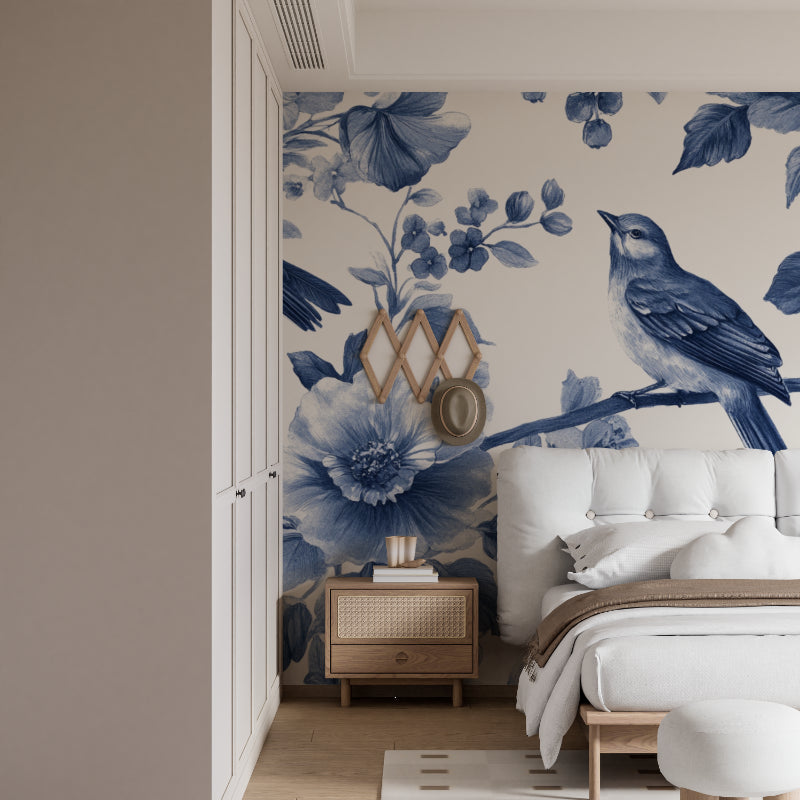 Elegant dining room featuring blue floral bird wallpaper with soft lighting