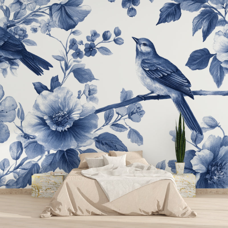 Home office space with calming blue bird and flower wallpaper design