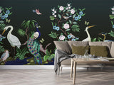 Exotic birds wall mural bringing nature into a bright living room with flowing garden design