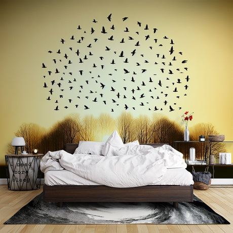 Birds wallpaper mural showcased in a bright modern living room, golden sunset tones warming the space