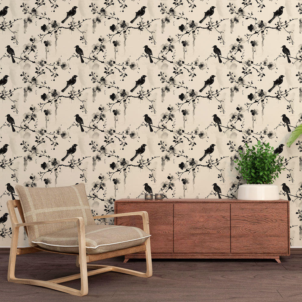 Japanese bird wallpaper with cherry blossoms creating a zen atmosphere in a modern living room with natural light