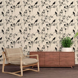 Japanese bird wallpaper with cherry blossoms creating a zen atmosphere in a modern living room with natural light