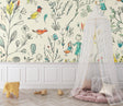 Birds Wallpaper styled in bright nursery with white furniture showing cheerful garden scene