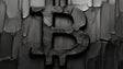 Bitcoin 3D textured wallpaper displayed in a modern office space, creating a powerful focal point behind a minimalist desk setup