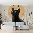 Japanese black cat wall mural creating a zen atmosphere in a modern minimalist living room with natural light