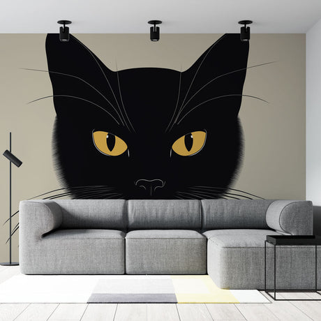 Black cat wall mural displayed in a modern living room, showing dramatic golden eyes against dark walls