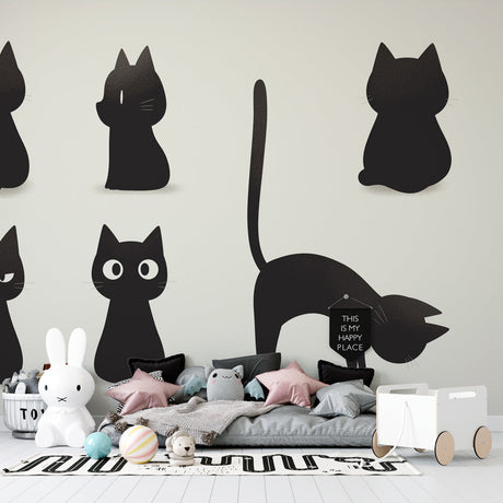 Black cat silhouette wallpaper displayed in a modern minimalist living room, creating a bold graphic statement wall