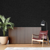 Modern black leather wallpaper accent wall in urban loft space
