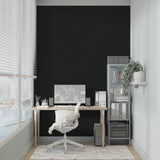 Master bedroom with sophisticated black wall design creating cozy atmosphere