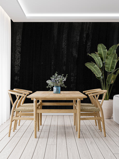Black wood wallpaper in modern dining room creating dramatic accent wall