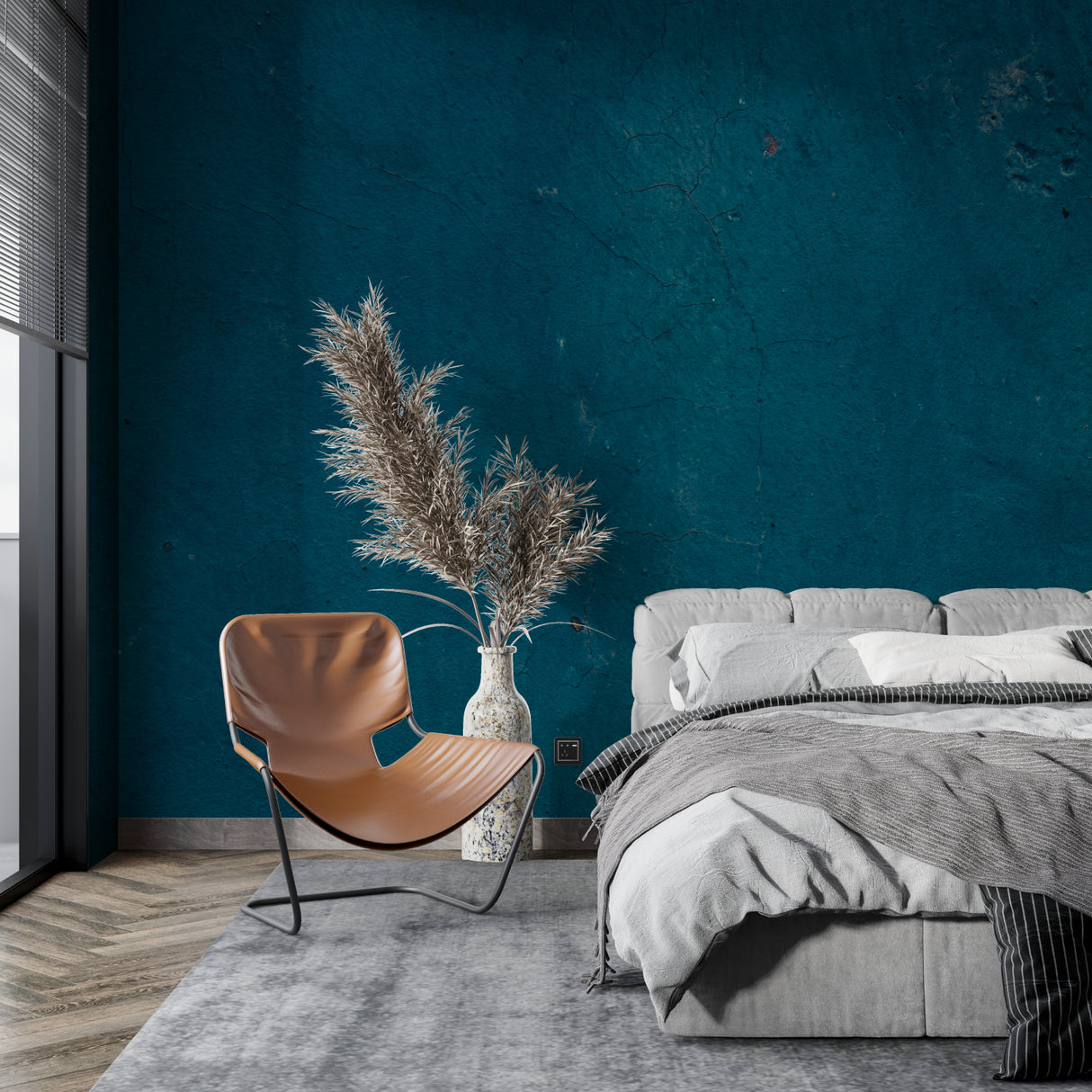 Teal textured wallpaper in modern living room with natural light highlighting surface details