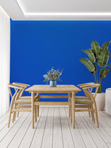 Bold blue mural wallpaper enhancing a modern entrance hallway