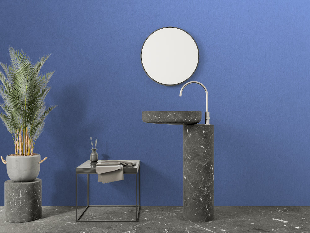 Deep blue wallpaper installation showcasing perfect color consistency in a bedroom setting