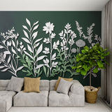 White paper cut floral wallpaper creating depth in modern living room with green accent wall and minimal furniture