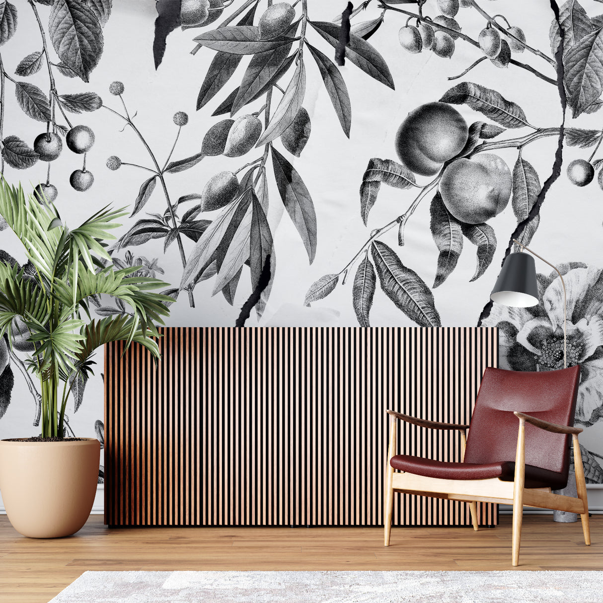 Botanical wall art installation in modern kitchen featuring fruit motifs
