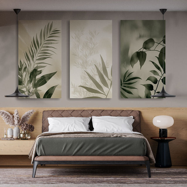 Botanical wall mural with green leaves creating a peaceful atmosphere in a modern living room with natural light