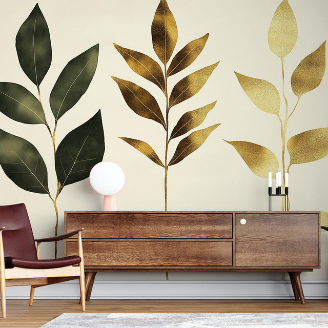 Botanical leaf wallpaper with gold accents creating an elegant atmosphere in a modern living room with natural light