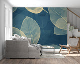 Deep blue and gold leaf wallpaper bringing luxury to a contemporary dining room