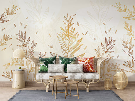 Botanical gold leaf wallpaper creating an elegant atmosphere in a modern living room with natural light
