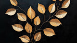 Gold and black botanical pattern design file showing detailed leaf motifs and intricate veining