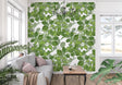 Botanical wallpaper with green hop pattern bringing life to a modern dining room setting