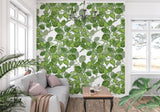Botanical wallpaper with green hop pattern bringing life to a modern dining room setting