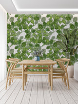 Fresh green hop pattern mural creating depth in a bright living room space
