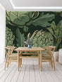 Botanical wallpaper with large artichoke design in a modern dining room, creating a fresh green accent wall