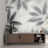 Grey botanical wall mural in master bedroom creating calm atmosphere