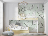 Mint green botanical wallpaper in a cozy bedroom setting with natural light