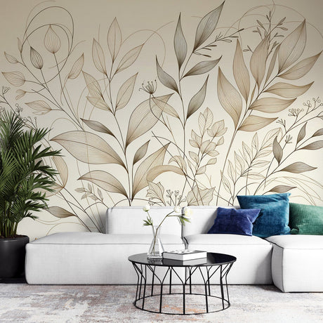 Botanical line art wallpaper in a bright modern living room showing delicate beige leaf patterns