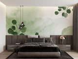 Green leaf wallpaper creating a peaceful home office environment with natural light