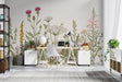 Botanical wallpaper with wildflowers brightening a modern living room with natural light