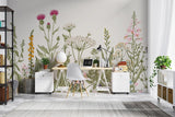 Botanical wallpaper with wildflowers brightening a modern living room with natural light