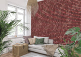 Brick mural creating urban loft feel in bedroom setting