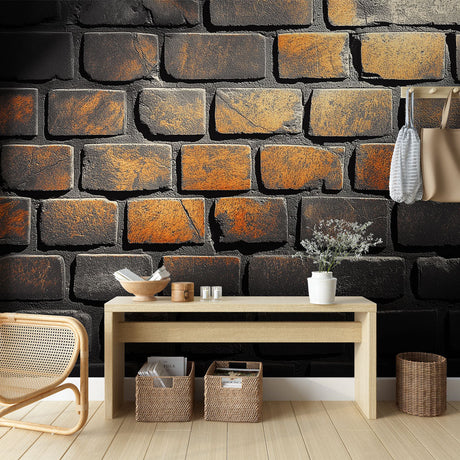 Industrial black brick wallpaper with rust accents styled in a modern loft living room, creating an urban atmosphere