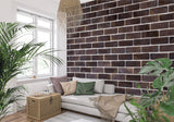 Brown brick wallpaper in modern living room with grey sofa and natural light